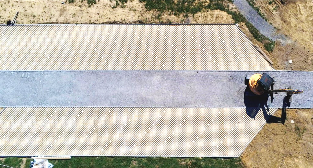 Dalle gazon bas carbone pour parking drainant